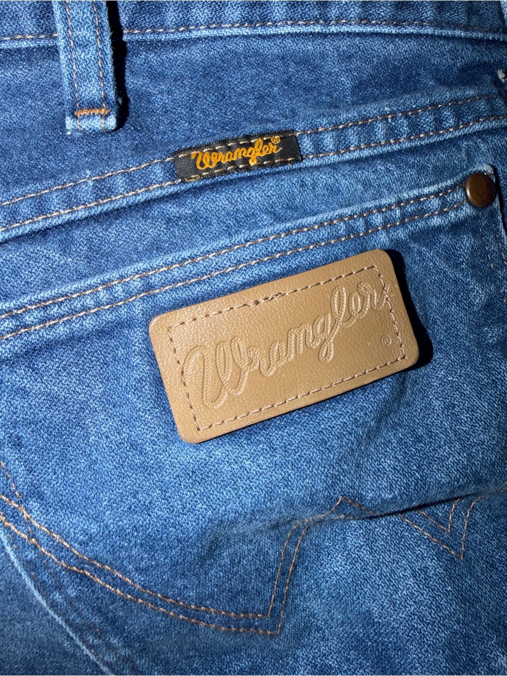 Wrangler Blue Denim Jeans with Brown Leather Patch
